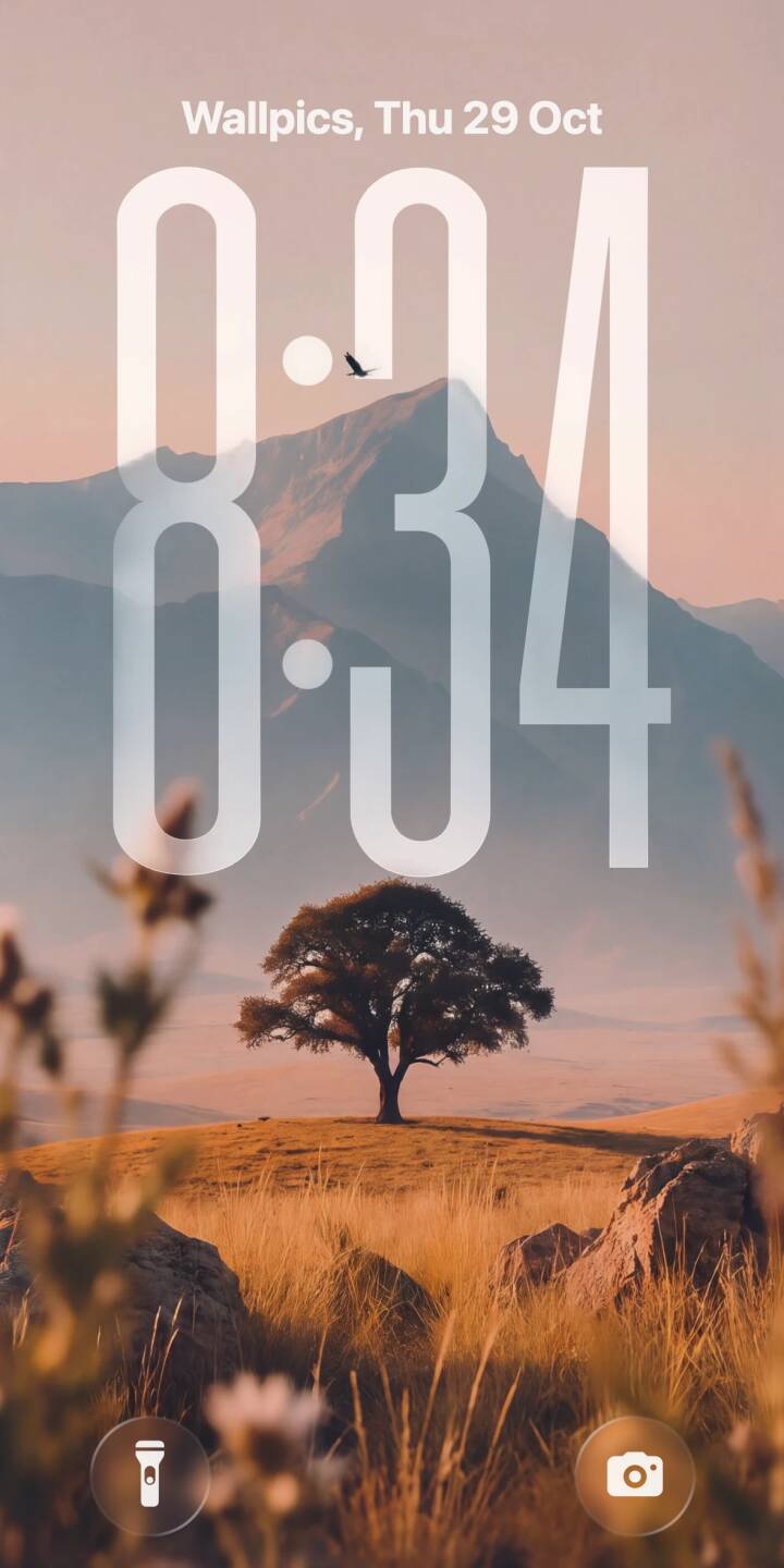 Golden hour light bathes a majestic lone tree on a rolling hillside, silhouetted against hazy mountain peaks and a soft pastel sky with a distant flying bird in this tranquil 4K wallpaper; it's the perfect nature wallpaper for your iPhone. | landscape bird iphone nature mountains wallpaper mobile golden hour 4k wallpaper hd wallpaper lone tree serene Golden hour light bathes a majestic lone tree on a rolling hillside, silhouetted against hazy mountain peaks and a soft pastel sky with a distant flying bird in this tranquil 4K wallpaper; it's the perfect nature wallpaper for your iPhone.